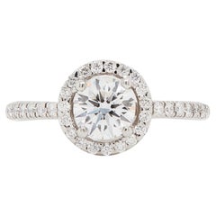 GIA 0.70ct E VS1 Diamond and Platinum Round Halo Cluster Engagement Ring