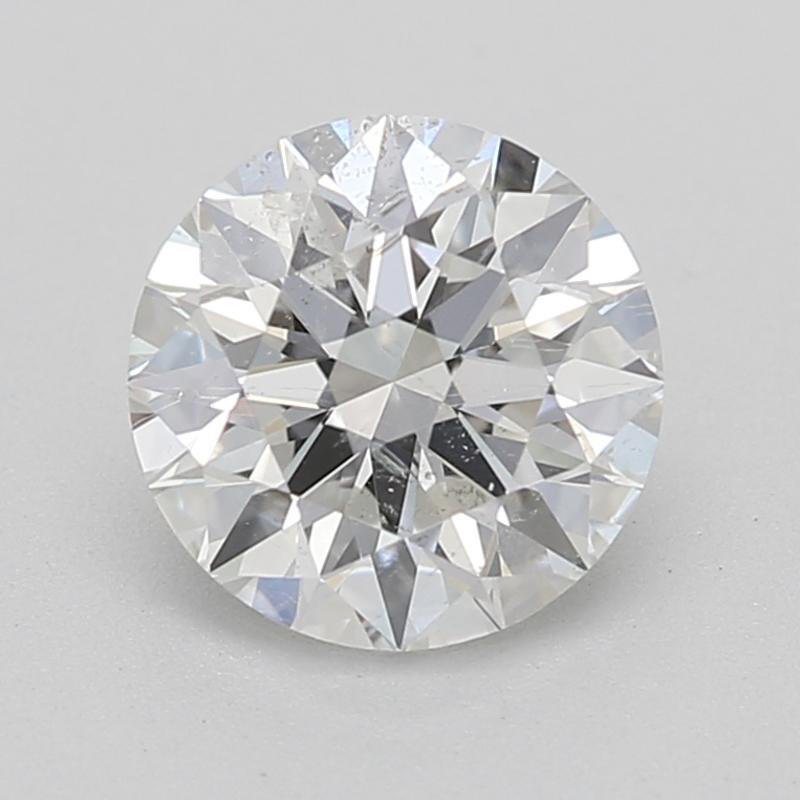 Handcrafted in New York, a stunning diamond ring that showcases a mesmerizing round center stone weighing 0.74. This remarkable piece features a pristine H and captivating I1 , radiating exceptional brilliance and fire. Crafted with meticulous