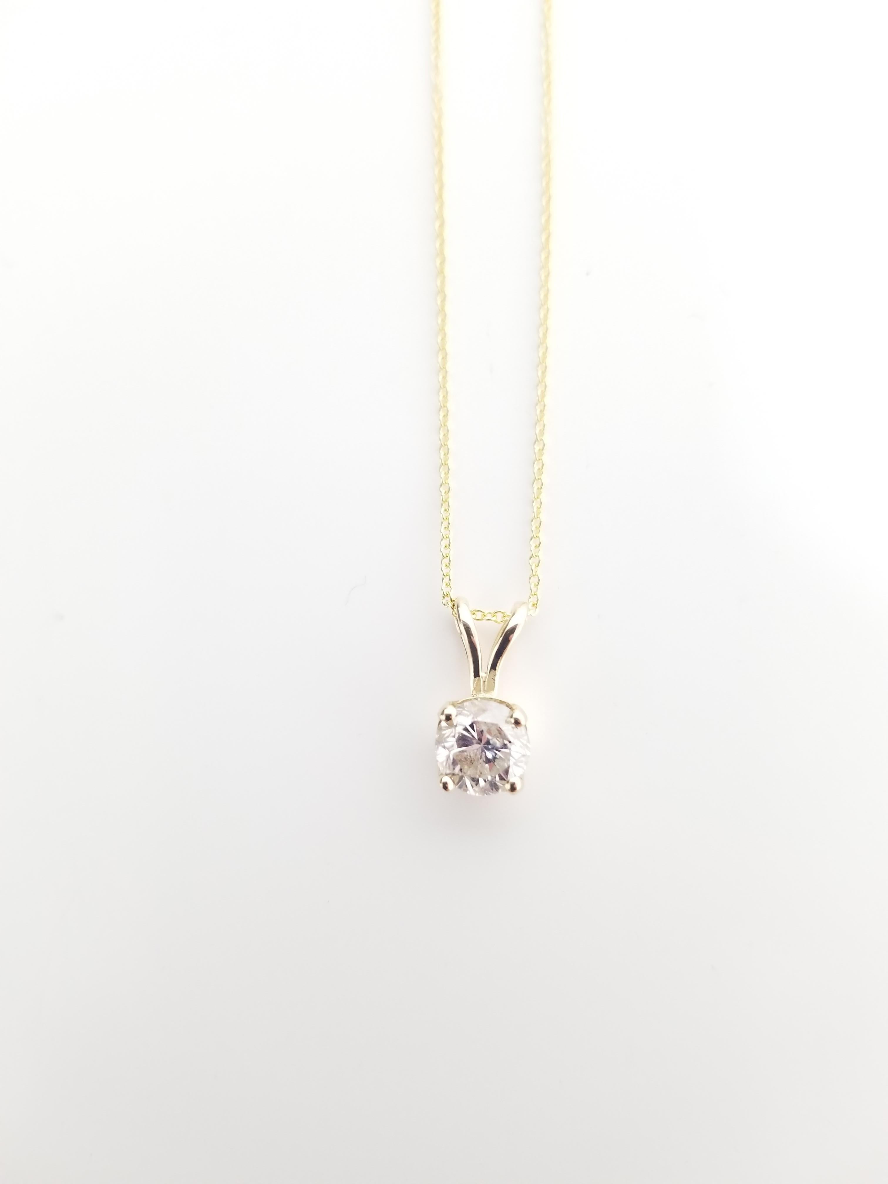 Gorgeous diamond pendant, 0.80 ct GIA round brilliant cut diamonds. set in 14k yellow gold. pendant measures approximately 0.5 inch length and 0.25 inch wide.

(Pendant Only - Chain sold separately)