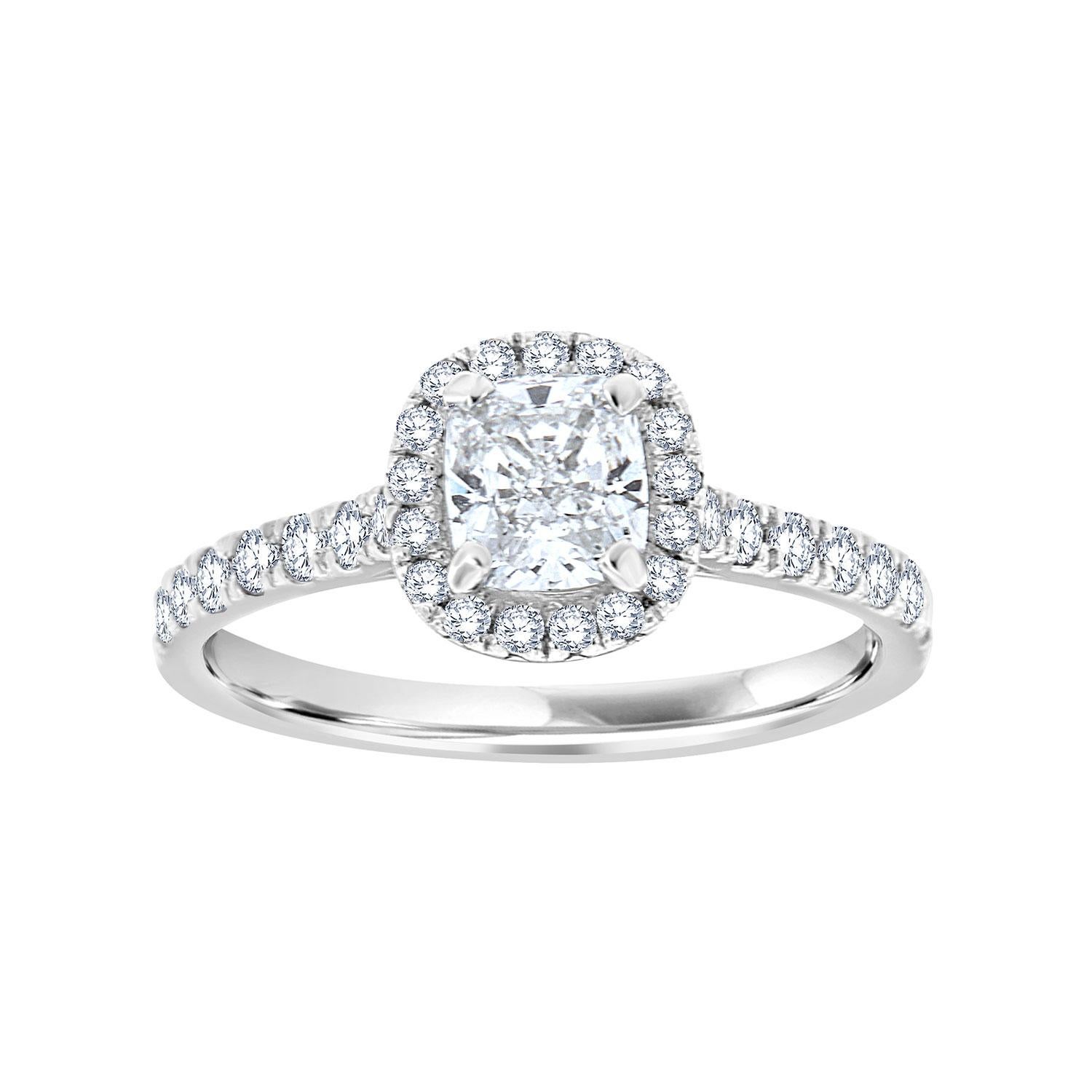 This Stunning Platinum ring set features a 0.81-Carat Cushion-shaped diamond H color and VS1 in clarity GIA Certificate 6382577288. The Center diamond is encircled by a delicate halo of diamonds on top of a 2.5mm Platinum band. Sixteen (16)