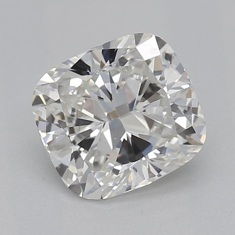 Handcrafted in New York, a stunning diamond ring that exemplifies timeless beauty and sophistication, featuring a captivating cushion center stone weighing 0.81 with a striking G and clarity of VS2. Its classic three-stone design is enhanced by two