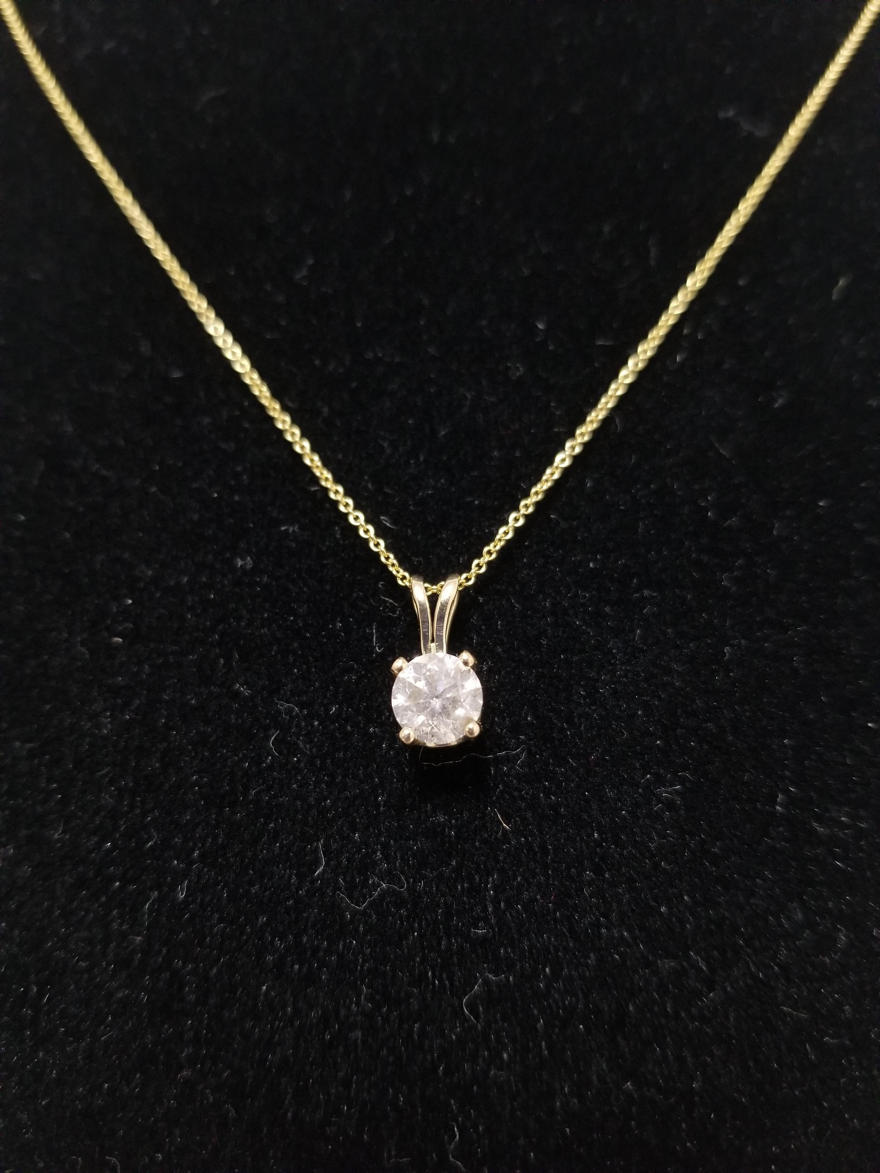 Gorgeous diamond pendant, 0.82 ct GIA round brilliant cut diamonds. set in 14k yellow gold. pendant measures approximately 0.5 inch length and 0.25 inch wide. 

(Pendant Only - Chain sold separately)