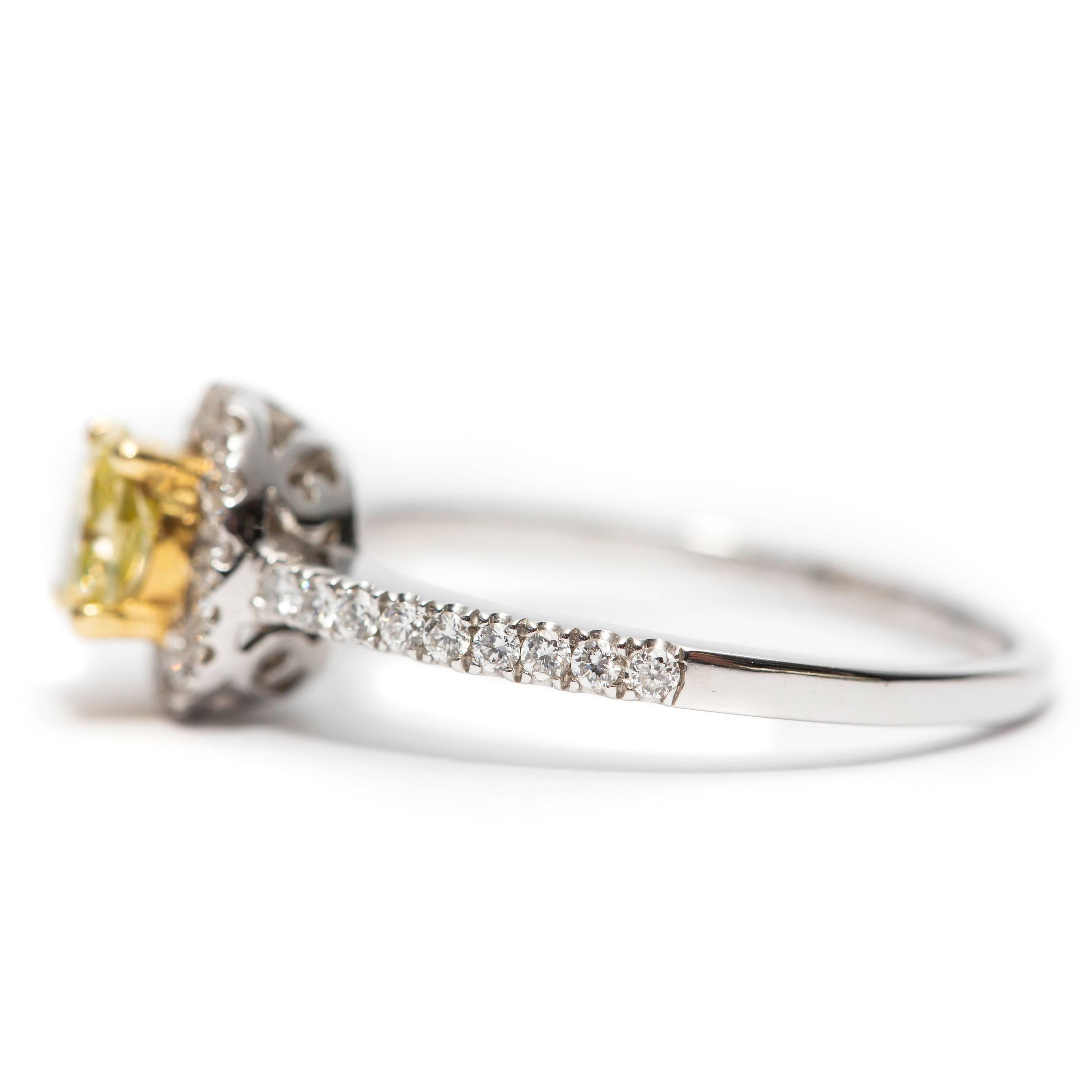 Modern GIA 0.87 Carat Yellow Cushion Diamond 18 Karat White Gold Halo Engagement Ring For Sale