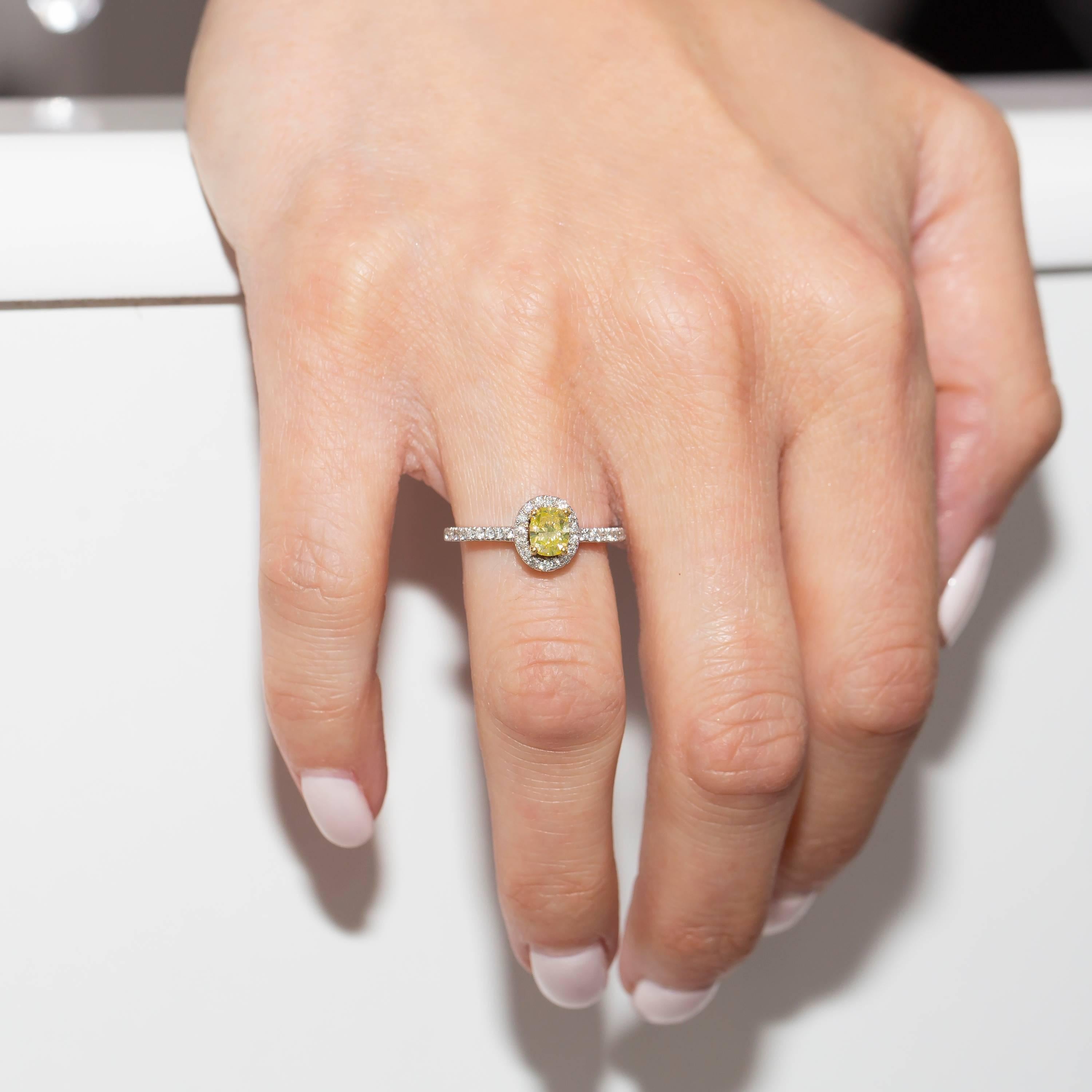 Women's GIA 0.87 Carat Yellow Cushion Diamond 18 Karat White Gold Halo Engagement Ring For Sale