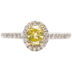 GIA 0.87 Carat Yellow Cushion Diamond 18 Karat White Gold Halo Engagement Ring