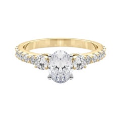 GIA 0,90ct Ovale a tre pietre con gambo di diamante Anello con diamante in oro giallo 18 carati