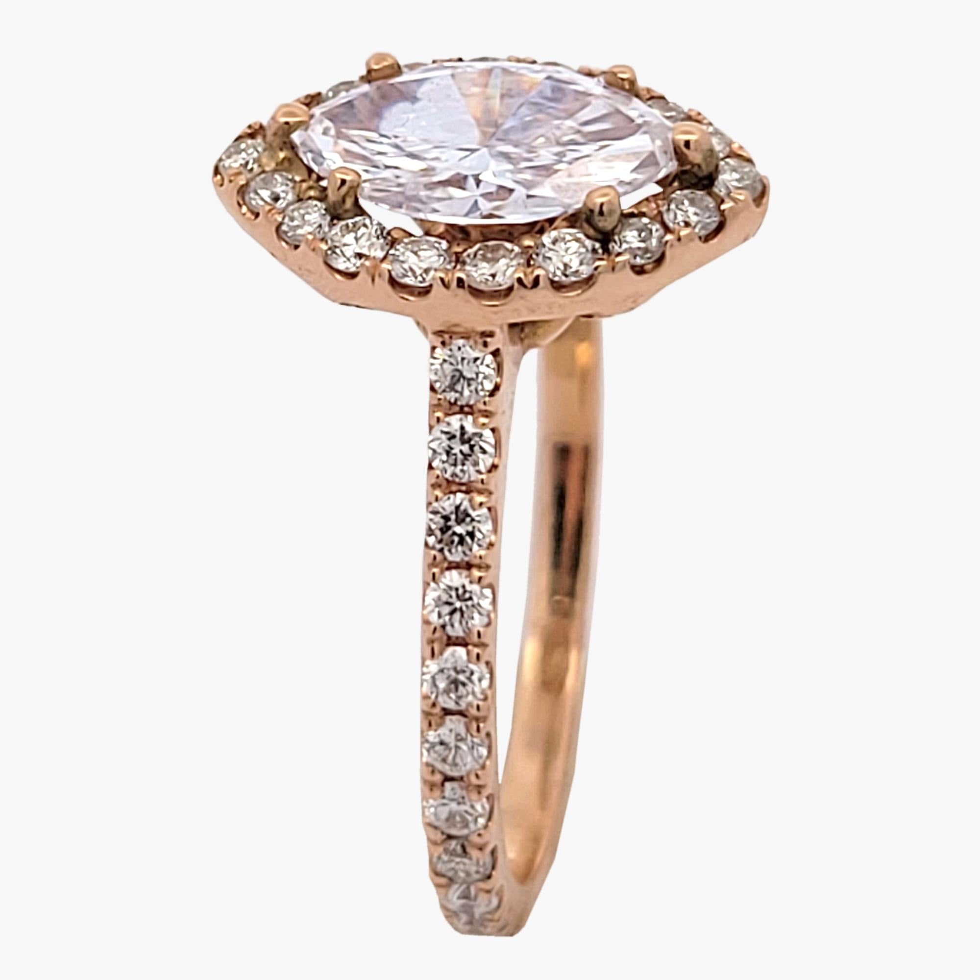 Contemporary GIA 0.93 Ct E/VS2 Marquise Diamond in a Pave Set 18K Engagement Ring with Halo For Sale