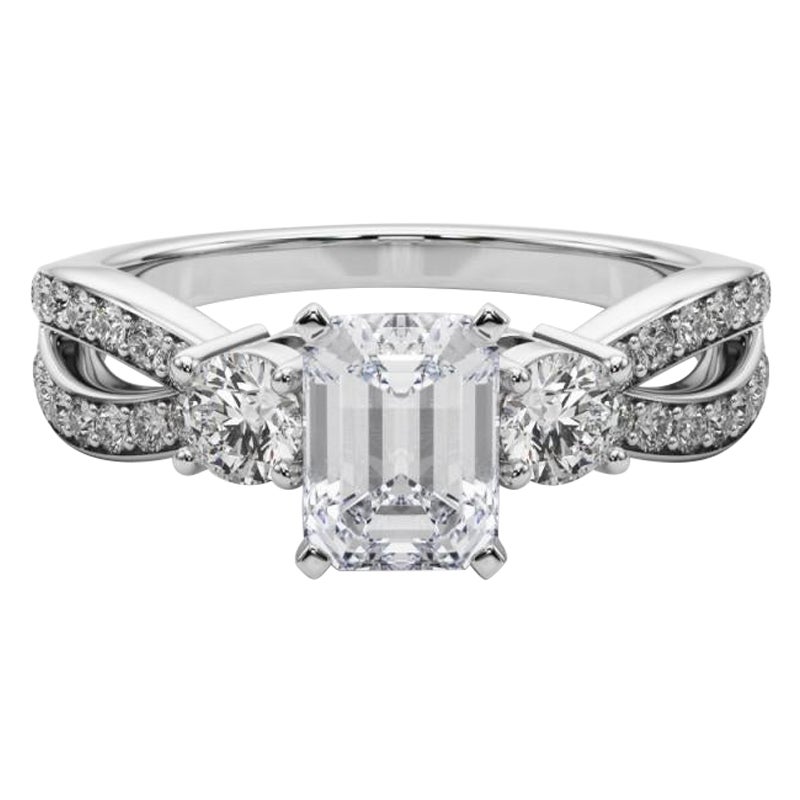 GIA 0,9ct Smeraldo a tre pietre Split Shank Pave Anello con diamanti in oro bianco 18K