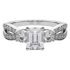 GIA 0,9ct Smeraldo a tre pietre Split Shank Pave Anello con diamanti in oro bianco 18K