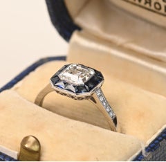 GIA-zertifizierter Verlobungsring mit 1 Karat im Asscher-Schliff. Diamant-Saphir-Halo-Ring aus Platin