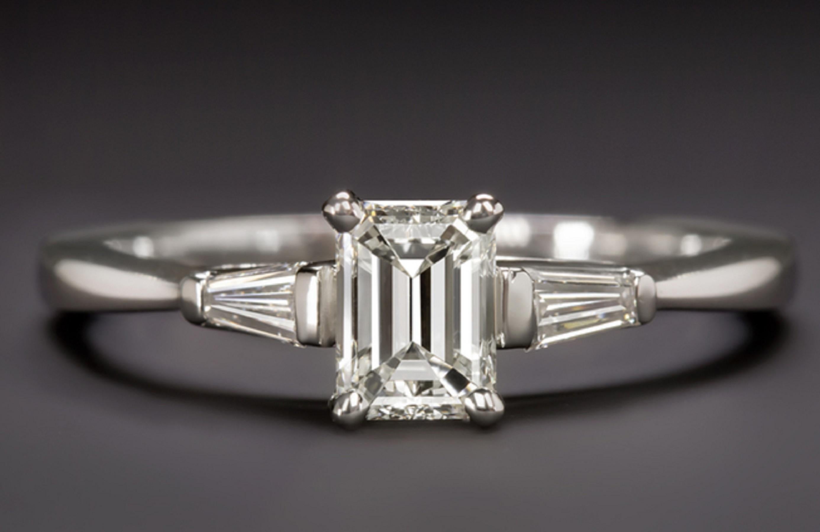 Modern GIA 1 Carat Certified Three Stone Emerald Cut Diamond Solitaire Gold Ring