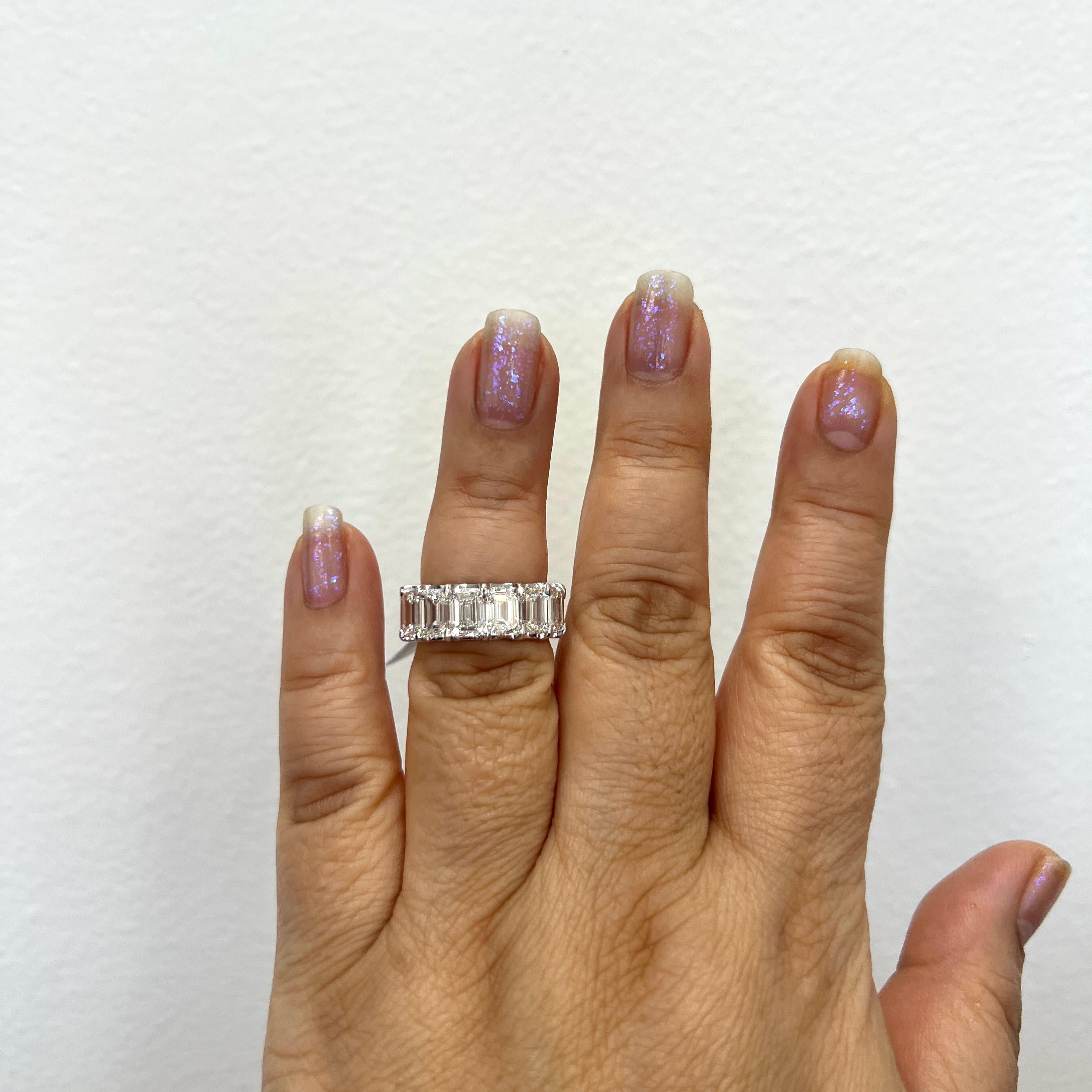 Gorgeous 14.00 ct. FG VVS - VS white diamond emerald cuts.  Total of 14 stones, each one weighs 1.00 ct.  Handmade in 18k white gold.  Ring size 5.75.  Each stone comes with a GIA certificate.

