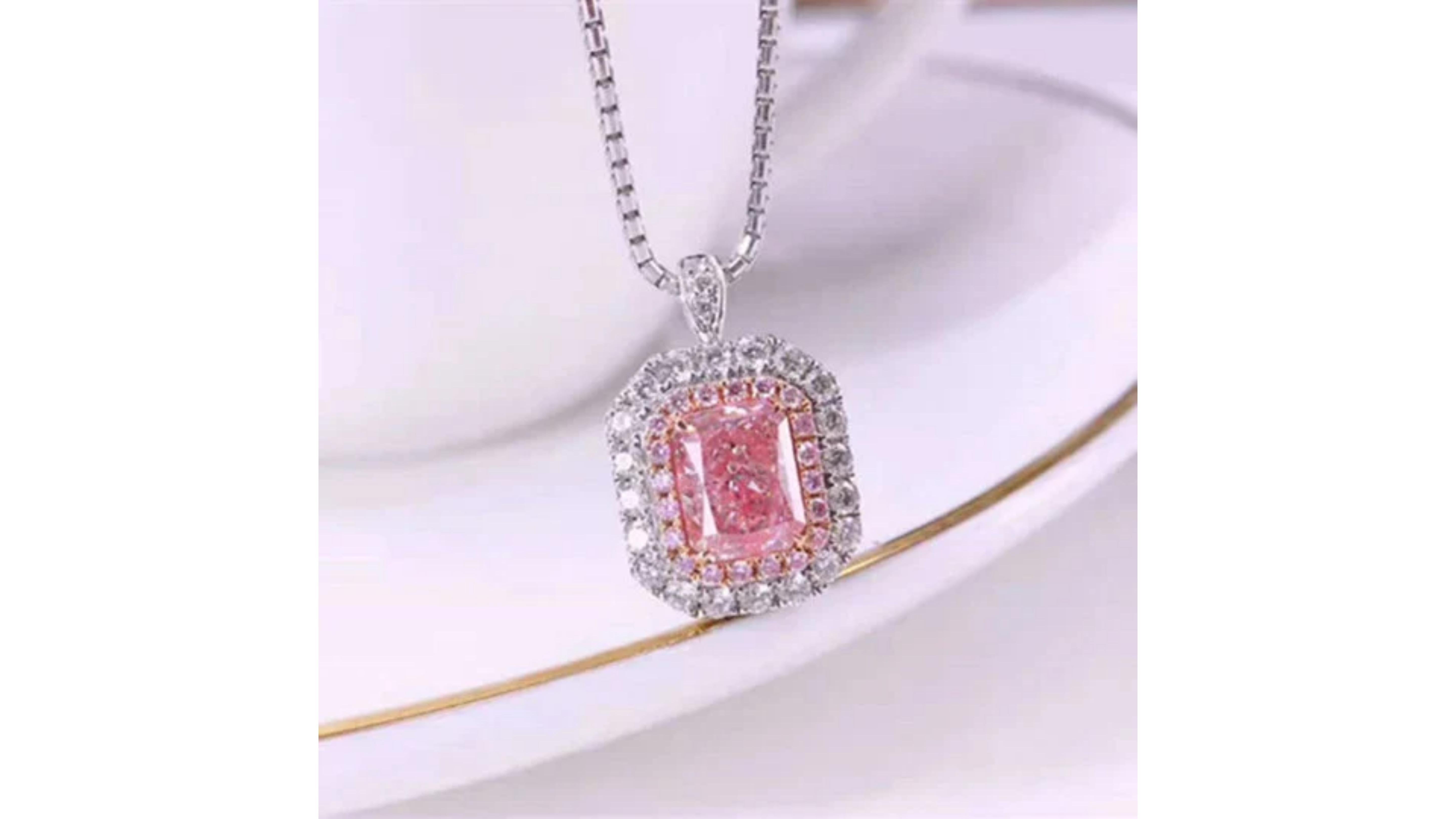 
GIA 1 Carat Fancy Pink Diamond Necklace 18 Karat White Gold Duel Use As Ring 


This is a  1ct  VS1   Pink Diamonds from Argyle Mine which has now closed making these very rare and its with 71 Diamonds and can also be a Ring  too with its duel use