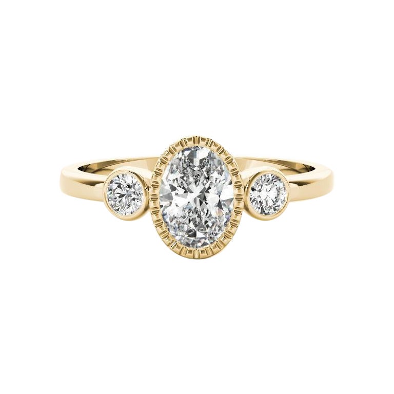 GIA Bague à trois pierres en or jaune 18 carats avec chaton texturé et ovale de 1 carat en vente