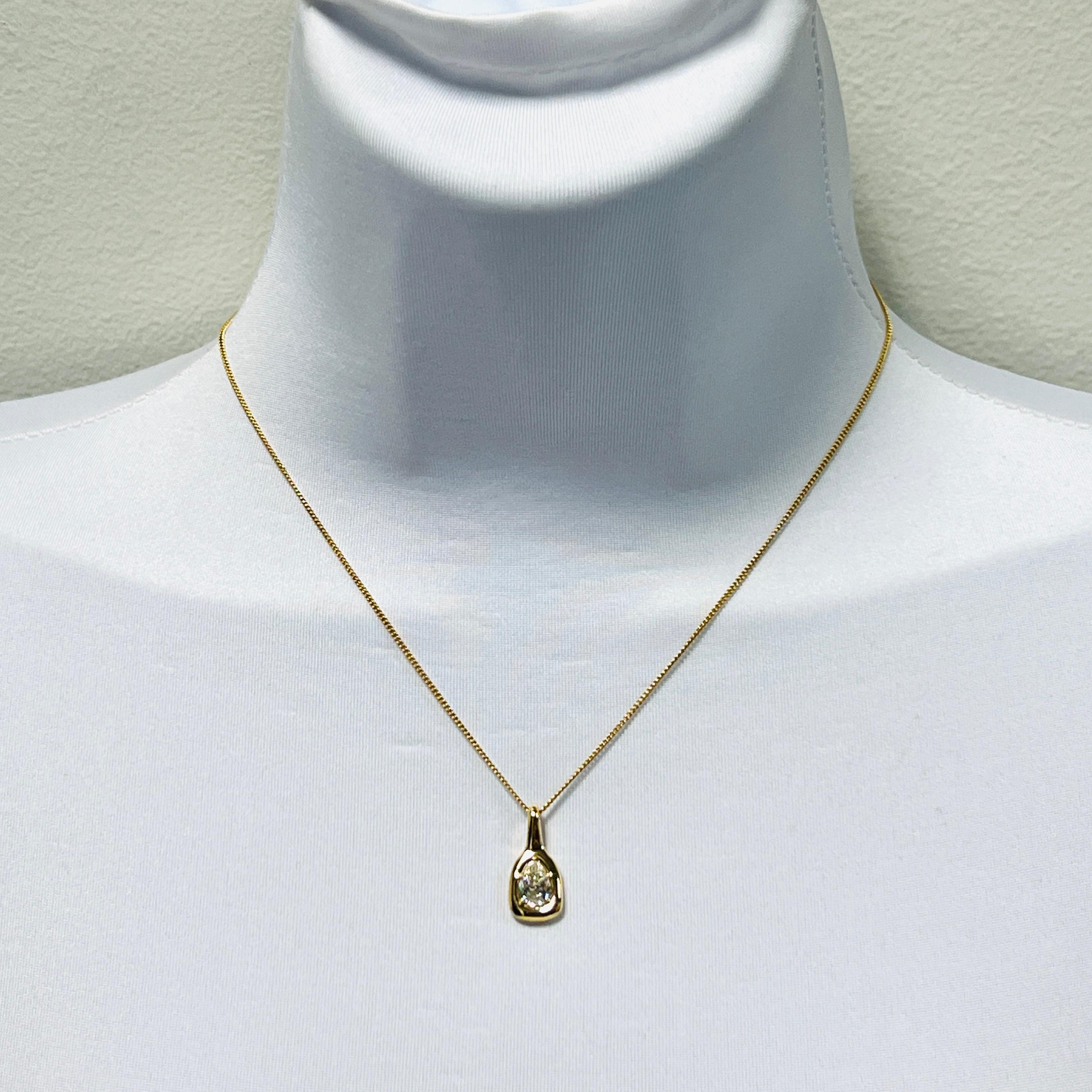 Beautiful 1.00 ct. J VVS2 white diamond pear shape.  Handmade in 18k yellow gold.  Length is 16