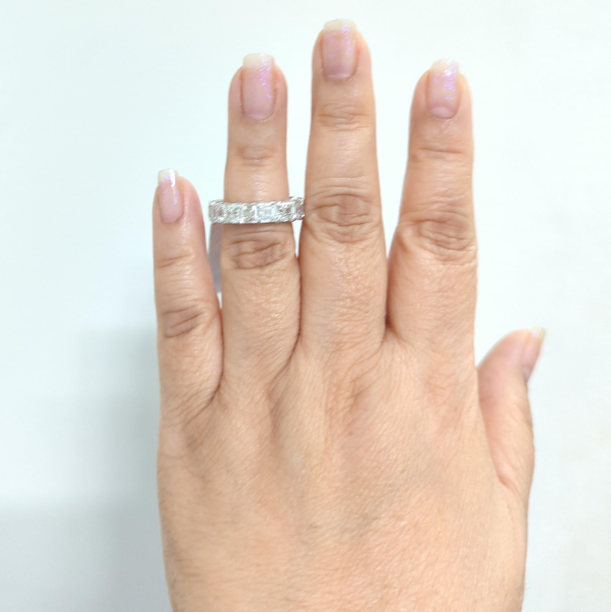 Gorgeous 10.53 ct. HI VVS1-VS2 white diamond asscher cuts.  Handmade in 18k white gold.  Each diamond is 0.70 ct.  Ring size 6.5.  GIA certificates included.  Ring can be custom made in other sizes.