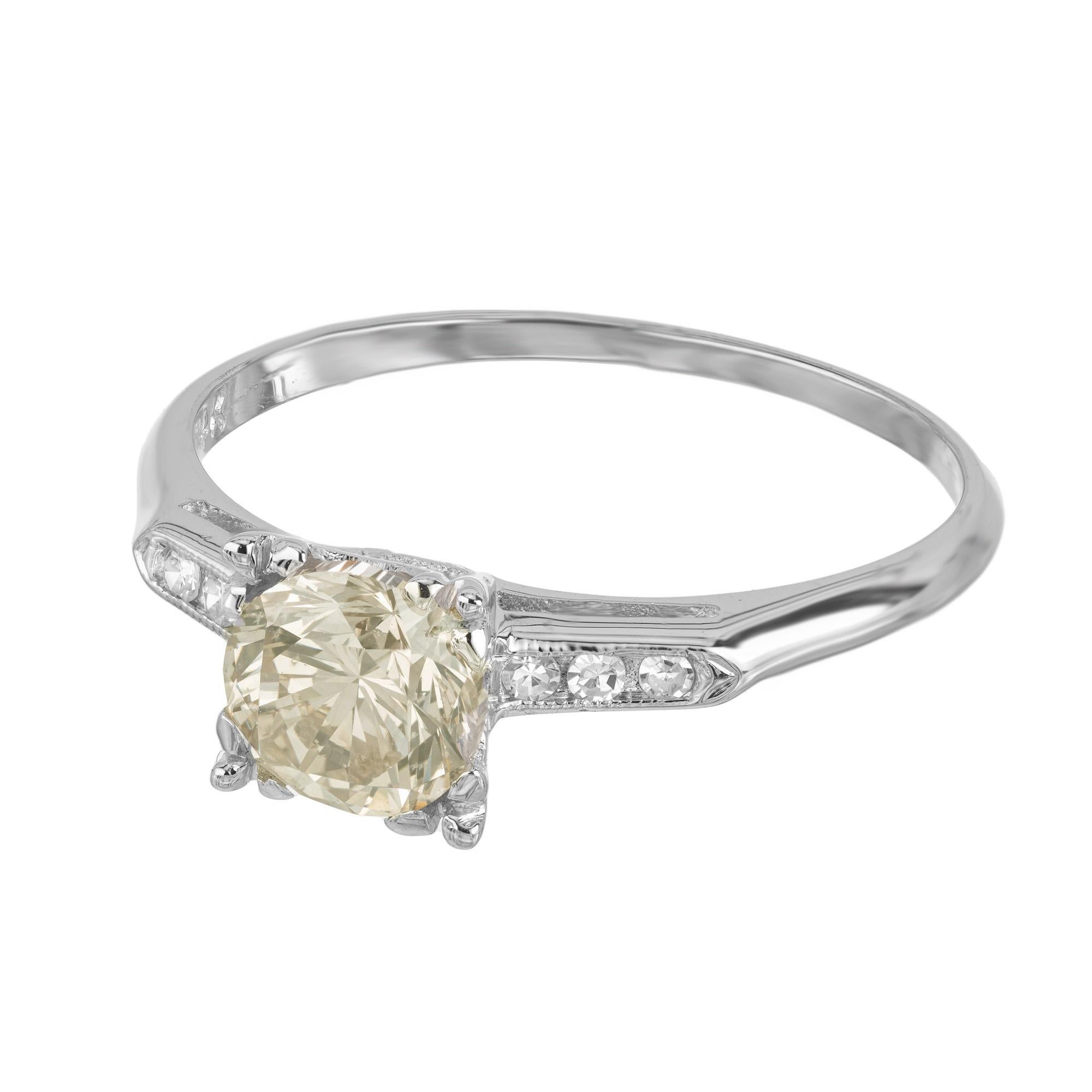 1930-1939 Art Deco round diamond engagement ring. The center diamond is a 1.00 Carat round cut GIA certified diamond which is accented by three sing cut diamonds on each side of the stone. This ring is not just a piece of jewelry, it's a journey