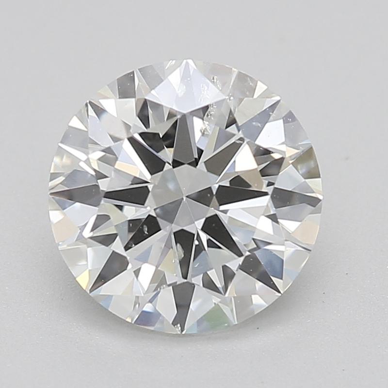 Fabriquée à la main à New York, cette magnifique bague en diamant est ornée d'une pierre centrale captivante de forme ronde, pesant 1,00 et affichant un magnifique H avec un impressionnant degré de clarté de SI2. Sertie dans un luxueux platine,