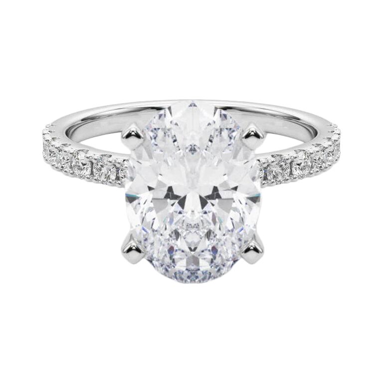 GIA 10,04ct Solitario ovale con mezza eternità in oro bianco 18 carati