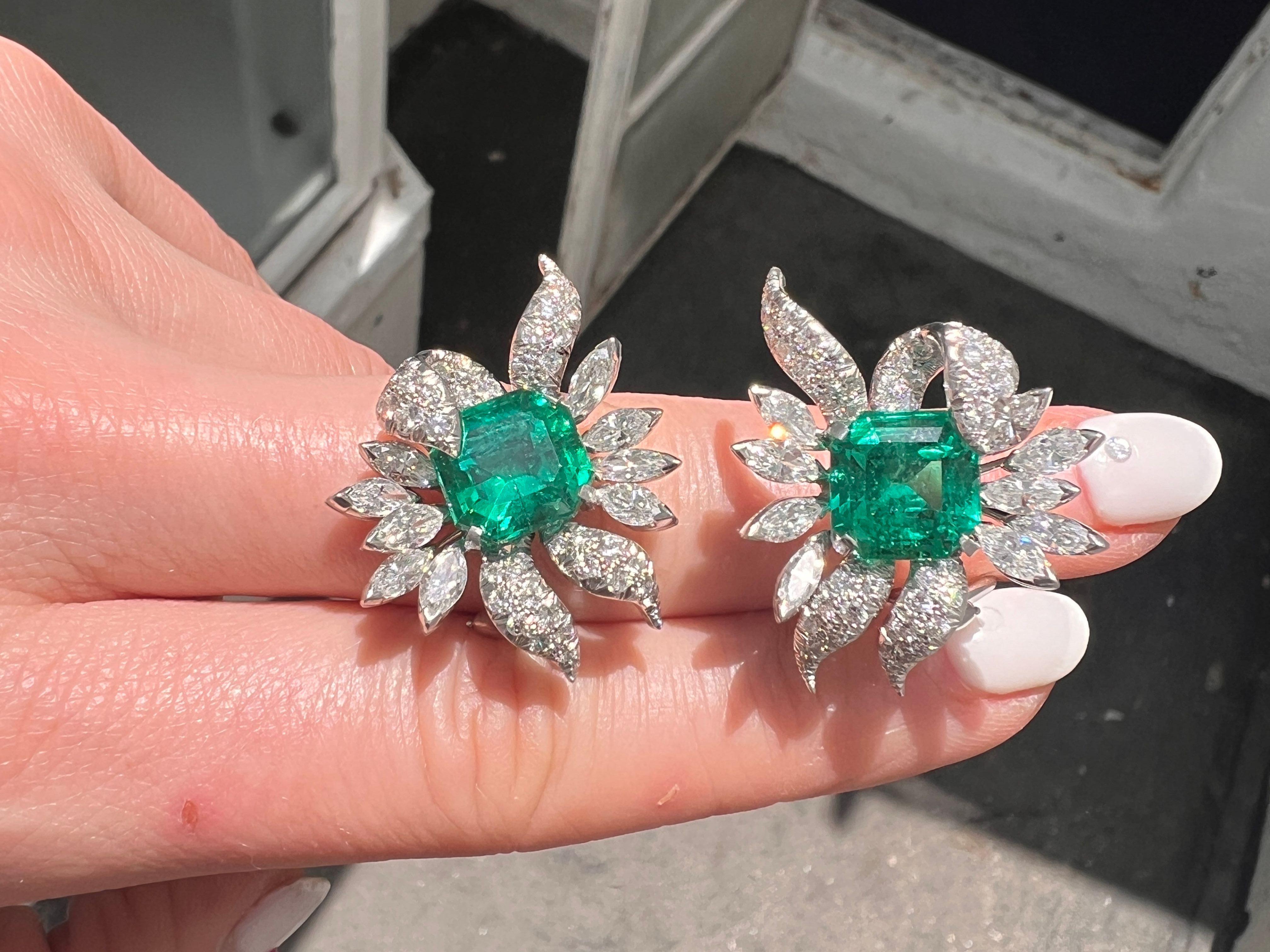 GIA-certified, 10.07-carat Colombia Minor Emerald and diamond Retro lever back stud earrings. 
These one-of-a-kind, meticulously crafted earrings showcase two vibrant Colombian minor emeralds, with a combined weight of 10.07 carats. These emeralds,