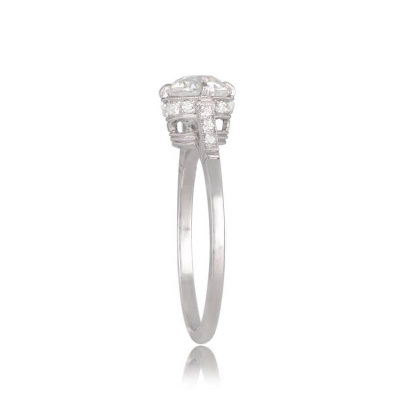 A vintage-style solitaire ring featuring a GIA-certified 1.00-carat old European cut diamond as the centerpiece. The shoulders and under-gallery are adorned with pave-set old European cut diamonds. Hand-crafted in platinum, this ring exudes timeless