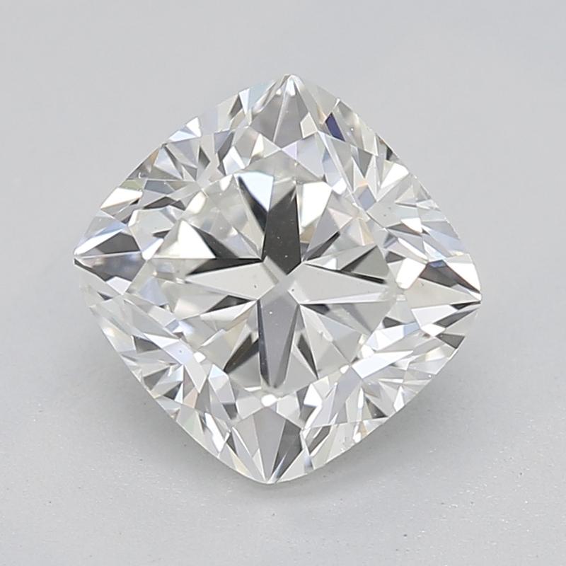 Handcrafted in New York, this stunning diamond ring features a captivating, GIA-certified center stone of cushion diamonds weighing 1.01 and graded G and SI1. The brilliance and fire of the center stone are beautifully complemented by a row of