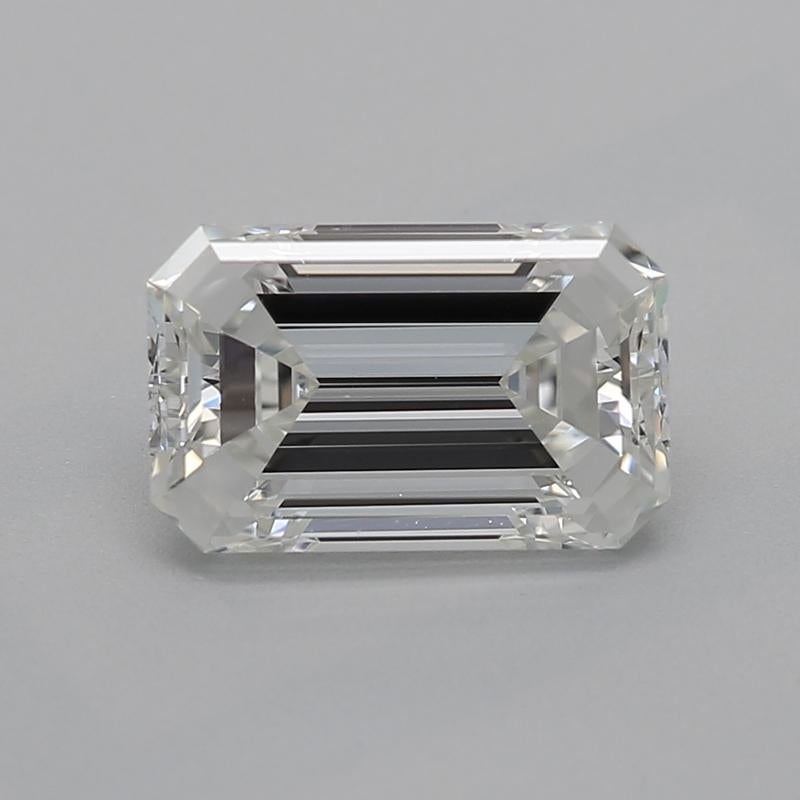 Elevate your jewelry collection with this stunning diamond ring, featuring a captivating emerald center stone weighing 1.01 and graded H with VS1. The meticulously crafted raised basket setting showcases the brilliance of the diamond, elegantly