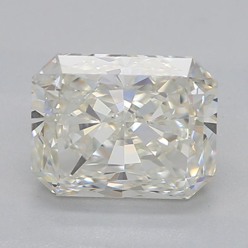 An elegantly designed diamond ring that exudes vintage charm and modern sophistication. Crafted from white gold , this ring features a stunning center stone in a breathtaking radiant cut. Weighing an impressive 1.01 , the diamond boasts a radiant J