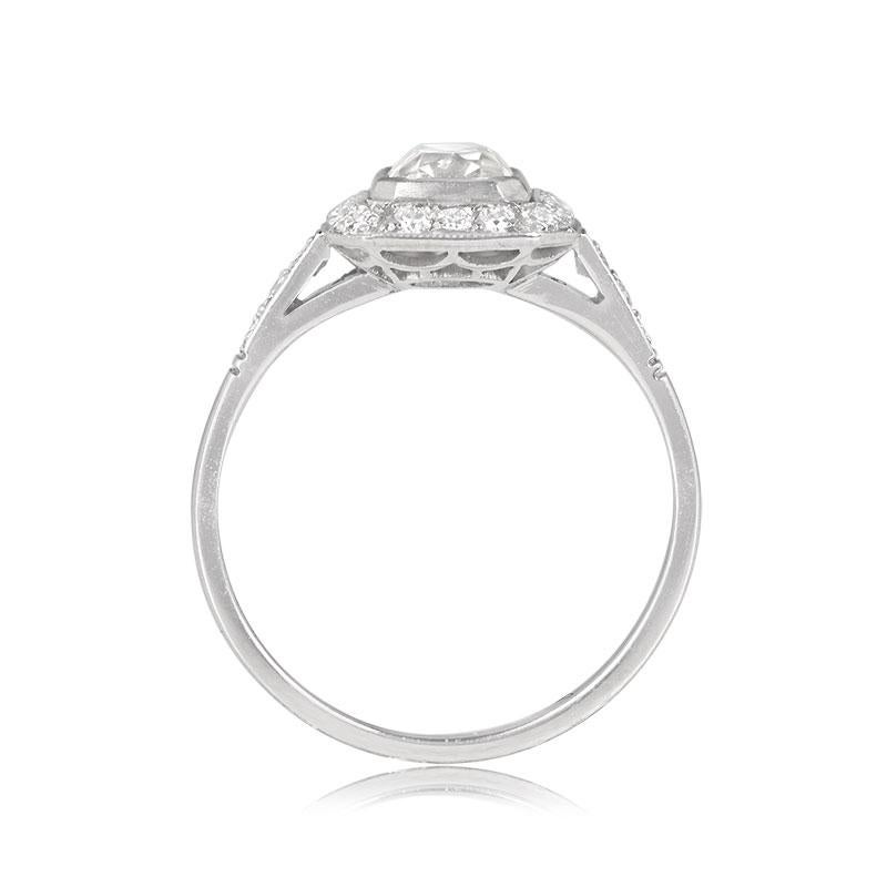 Elegantly elongated, this halo ring showcases a GIA-certified, 1.03-carat antique cushion cut diamond with H color and SI1 clarity at its center. An exquisite halo of old European cut diamonds gracefully encircles the main stone. Hand-crafted in