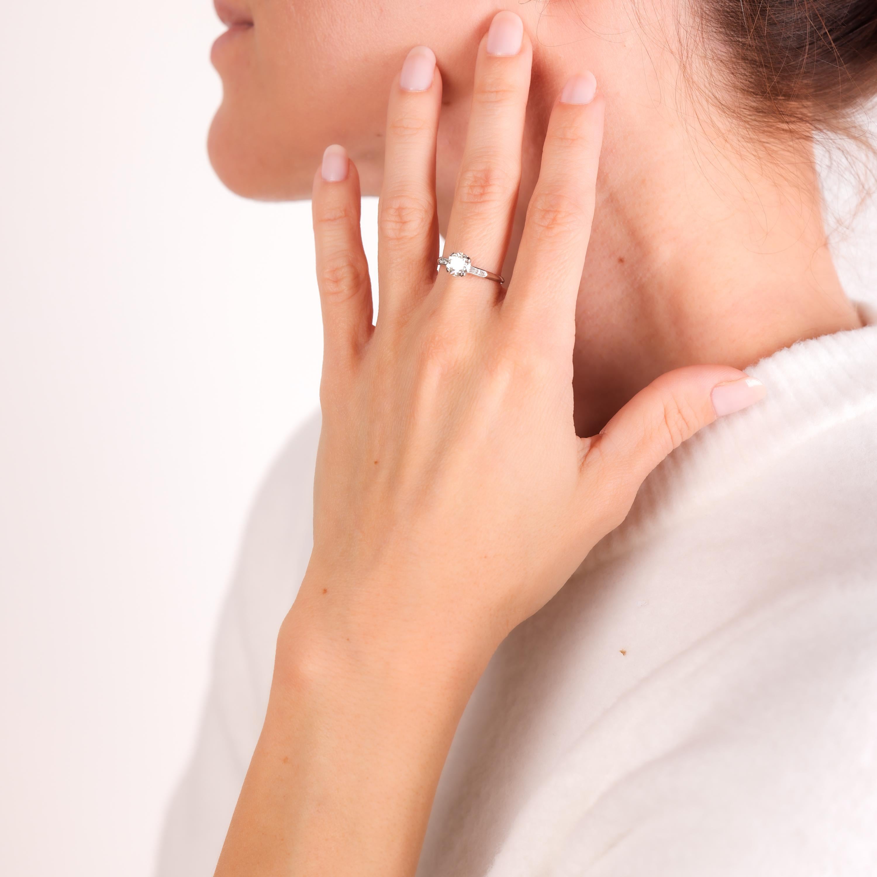 This Art Deco platinum ring features a GIA-certified 1.06-carat old European cut diamond paired with sparkling H/SI old mine diamonds in a timeless design.

Certificate: GIA #2235449915
Center stone: Circular brilliant cut diamond 
Weight: 1.06