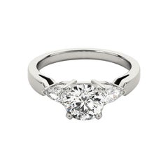 GIA 1.06 Carati Tondo Tre Pietre Est-Ovest Pera  Anello con diamante