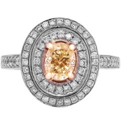 Bague en or blanc avec diamants de couleur jaune intense de 1,06 carat VS1 certifié GIA et diamants