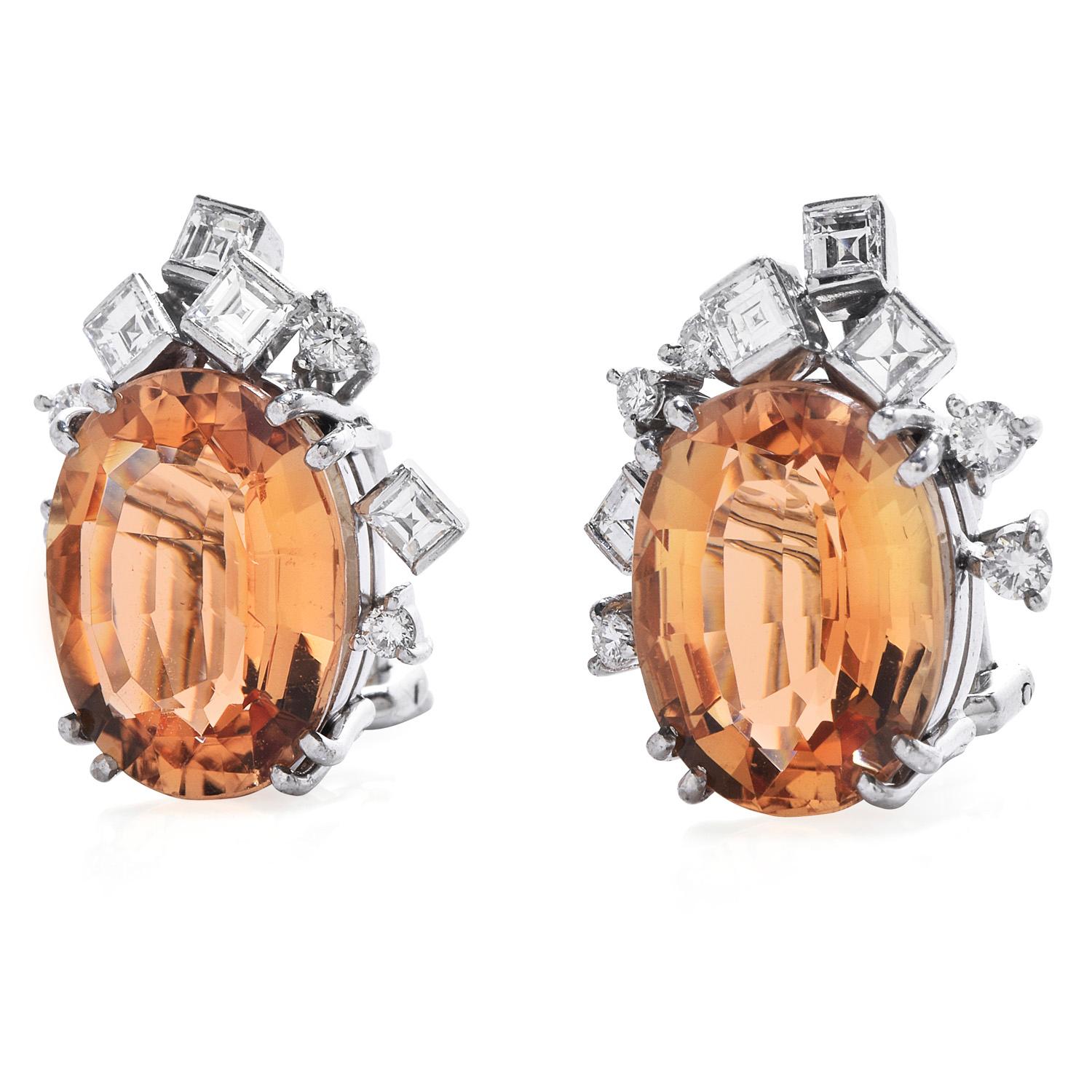 Vintage GIA 12.85ct Yellow Orange imperial Topaz Diamond 18K Gold Earrings

Add a Splash of color to your life

With these exquisite Topaz earrings reminiscent of the Sunrise and an approximate total weight of 11.0 Grams.

Expertly Crafted in 18K