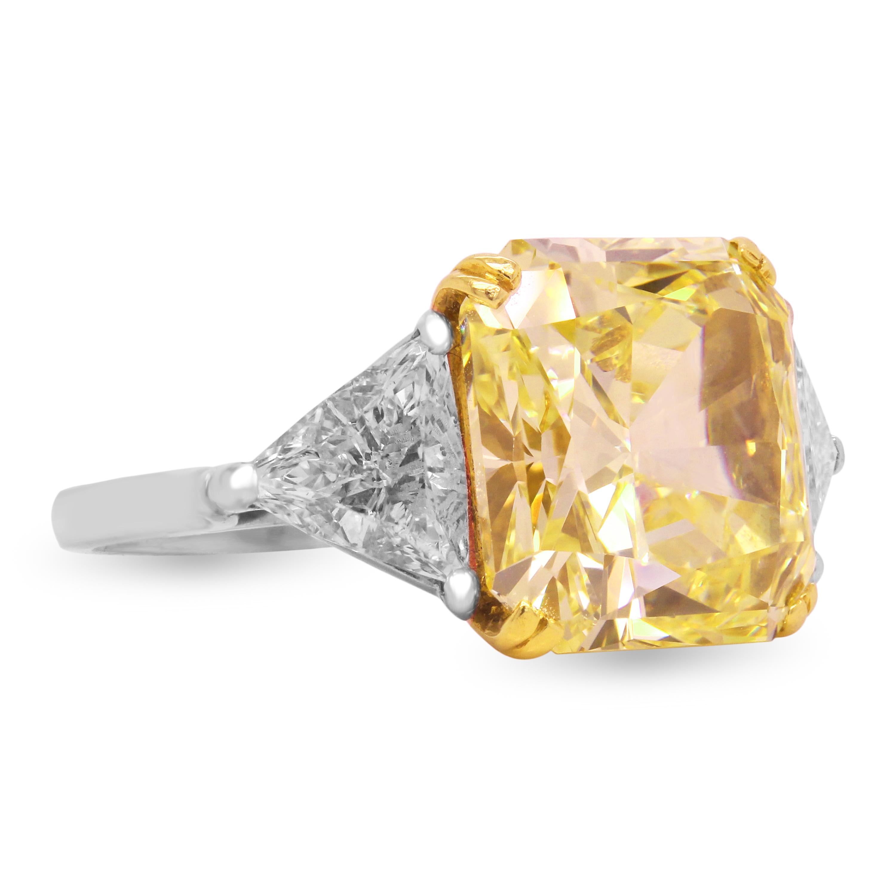 GIA Certified 11.22 Carat VVS1 Fancy Intense Yellow Diamond with Two Trillion Cut Diamonds set in Platinum

This exceptional Yellow diamond is beyond remarkable.

GIA Certified. Report Number: 11598214
11.22 carat. VVS1 Clarity. Natural Fancy