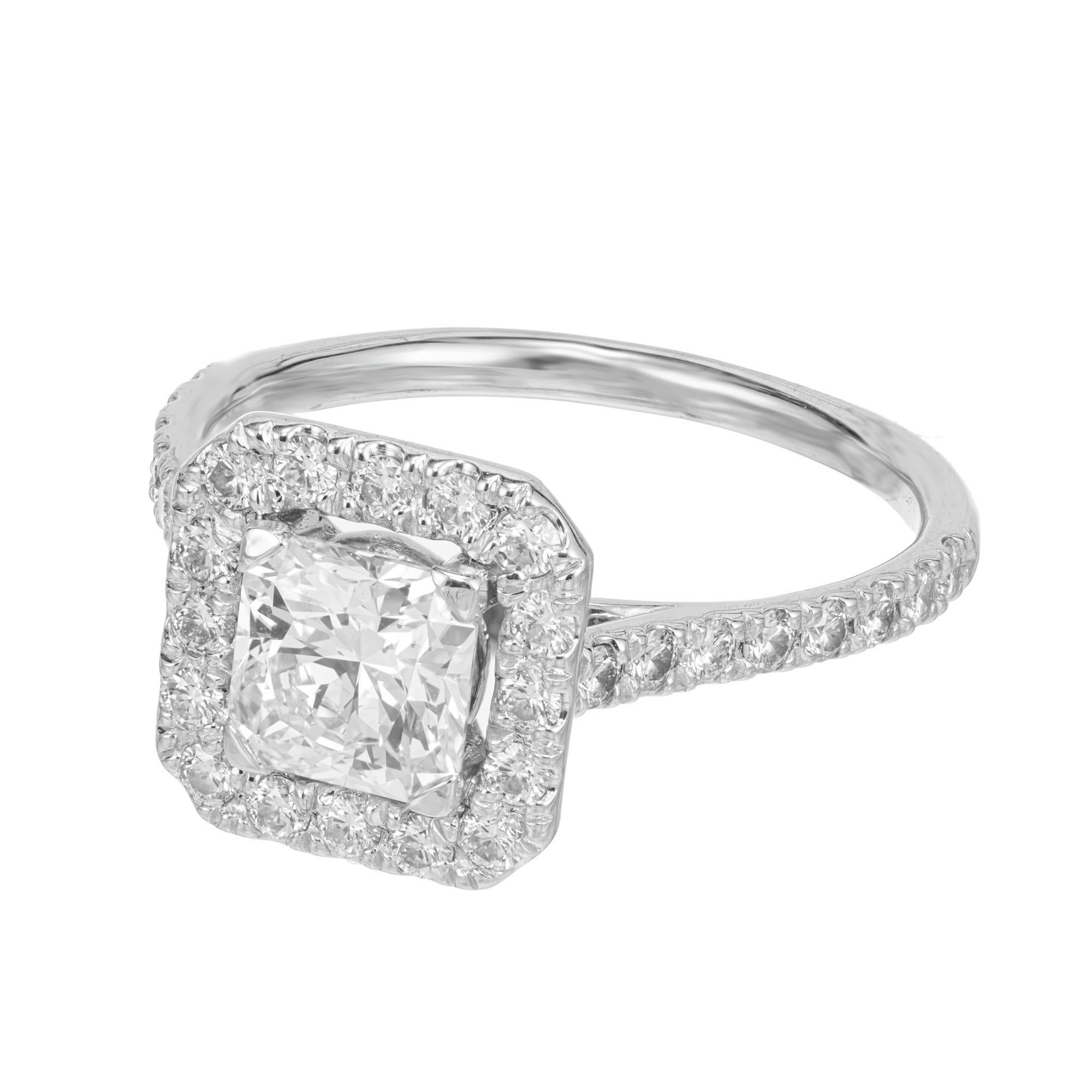 Hearts on Fire Dream Transcend diamond halo engagement ring. The GIA certified corner cut, squared brilliant shape 1.18 carat is inscribed Dream 9820 and graded F (colorless) and VS1 (very slightly included) clarity. Set in a platinum setting with