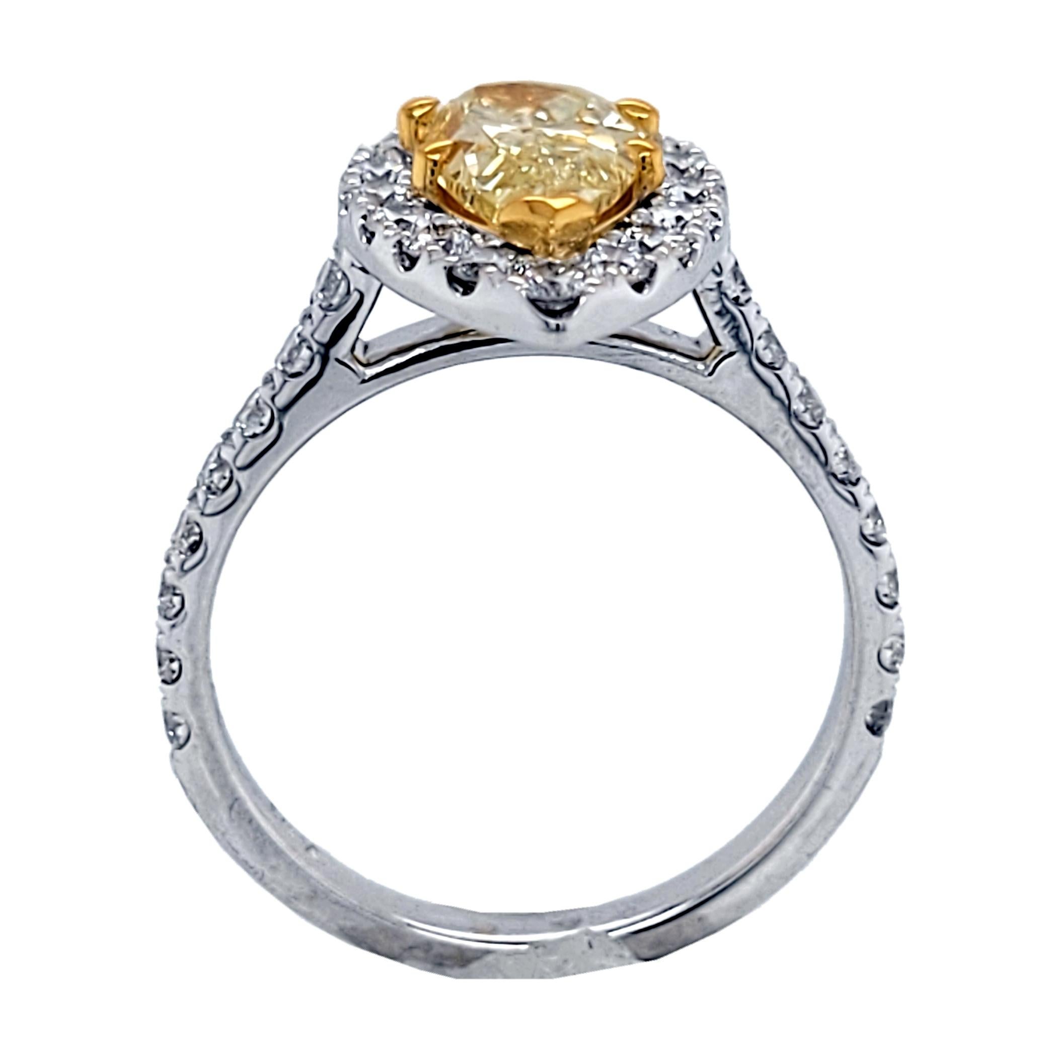 Contemporary GIA 1.20 Carat Fancy Light Yellow Pear Shaped 18 Karat Gold Ring with Halo For Sale