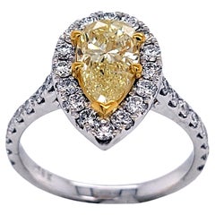 GIA 1.20 Carat Fancy Light Yellow Pear Shaped 18 Karat Gold Ring with Halo