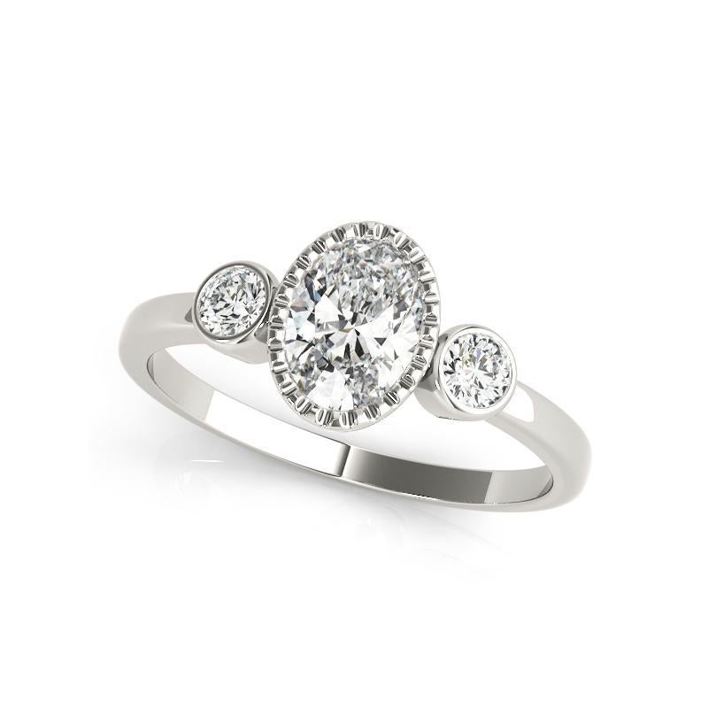 Oval Cut GIA 1.20 Carat Oval Textured Bezel Three-Stone 18K White Gold Diamond Ring For Sale