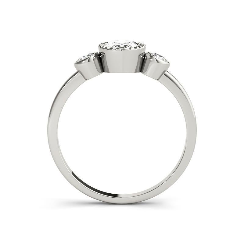 GIA 1.20 Carat Oval Textured Bezel Three-Stone 18K White Gold Diamond Ring In New Condition For Sale In New York, NY