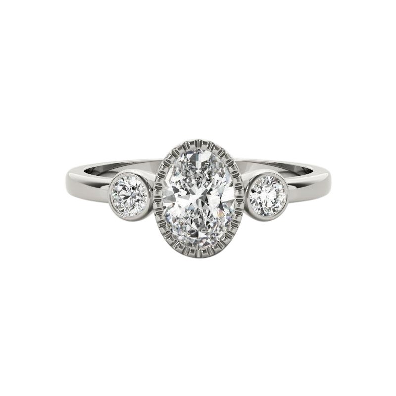 GIA 1.20 Carat Oval Textured Bezel Three-Stone 18K White Gold Diamond Ring