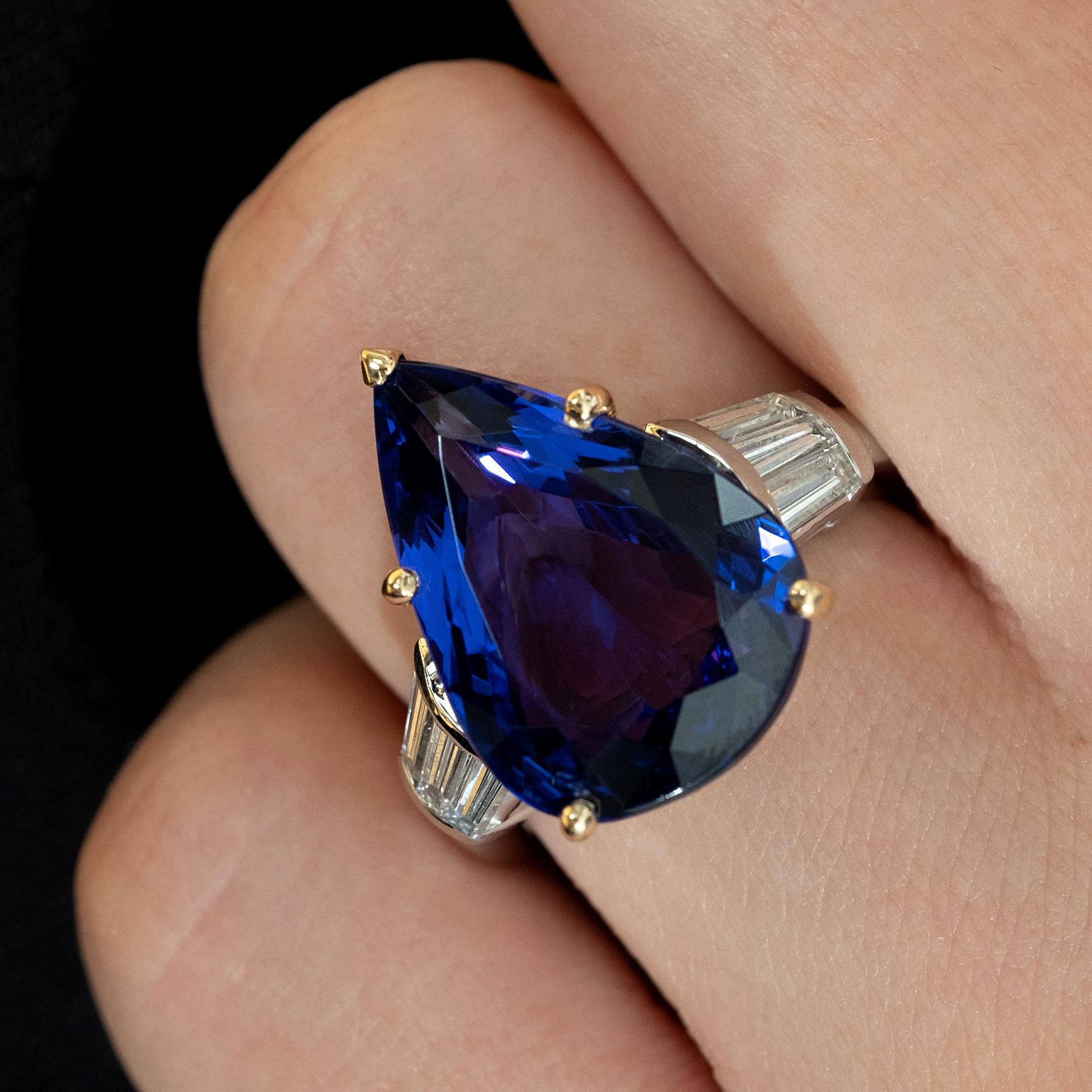 SUPER Fine Tanzanite is one of the most beautiful gemstone in the treasure of Mother Nature.
A RARE opportunity to own a HUGE and BEAUTIFUL Tanzanite ring with true substance! The total weight of the Gems is just shy 12.01ct.

The Tanzanite is