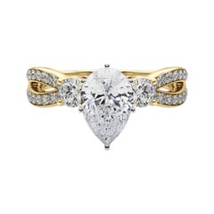 GIA 1,20 quilates Anillo de diamantes de oro amarillo de 18 quilates con vástago partido y tres piedras en forma de pera