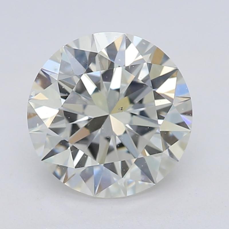 Dieser in New York handgefertigte Diamantring besticht durch einen runden Diamanten in der Mitte, der ein beeindruckendes Gewicht von 1,20 aufweist und durch sein exquisites H und VS2 ergänzt wird. Das einzigartige Design zeigt einen geometrischen