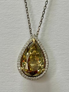 GIA 12.11 Carat Fancy Deep Brownish Greenish Yellow Pear Shape Diamond Necklace.