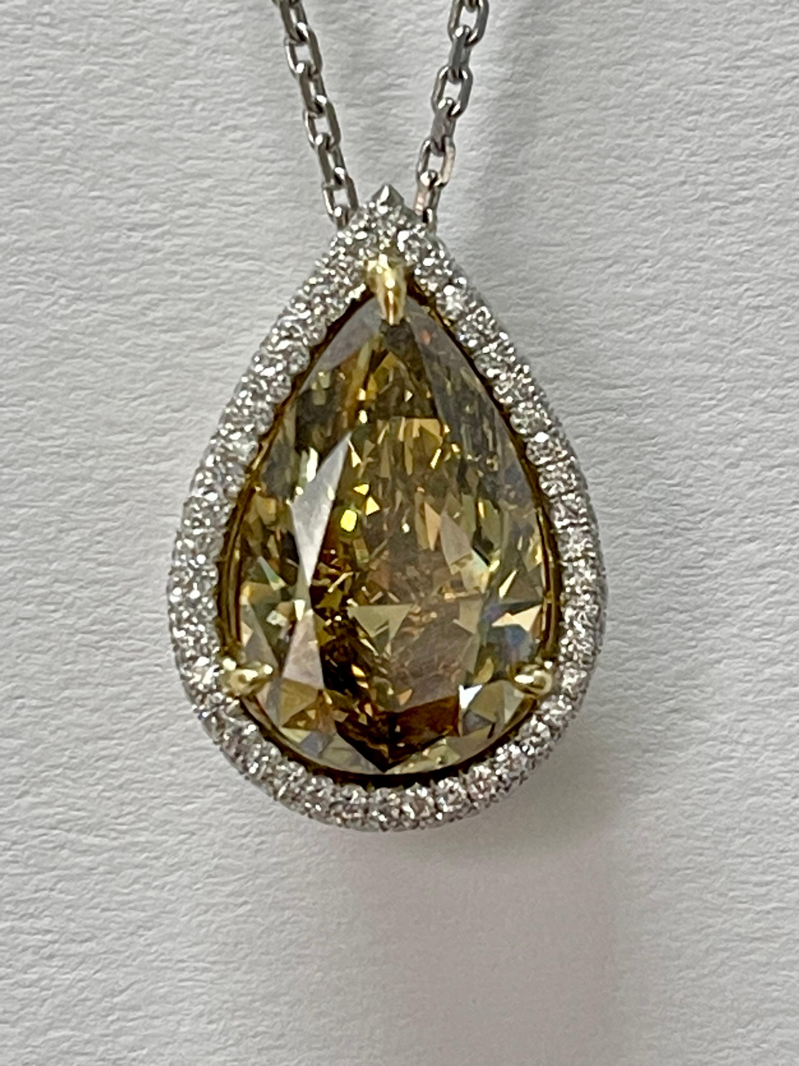 Women's GIA 12.11 Carat Fancy Deep Brownish Greenish Yellow Pear Shape Diamond Necklace. For Sale
