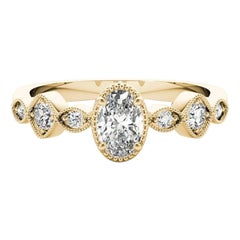 GIA 1,21ct Anello ovale con castone e pietre multiple a grana fine in oro giallo 18 carati