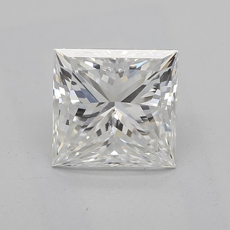 Immerse yourself in the elegance of this remarkable diamond ring featuring a dazzling princess diamond at its center. Weighing 1.21 , this exquisite gem is graded H and SI2 , ensuring a brilliant sparkle that captures the light beautifully from