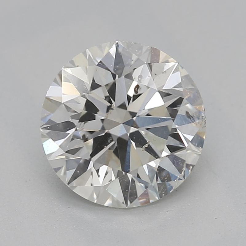 This stunning round diamond ring features a breathtaking J SI2 center stone weighing 1.21 , radiating exceptional brilliance and fire. Crafted with precision, the ring is set in luxurious yellow gold , providing a warm and inviting aesthetic that