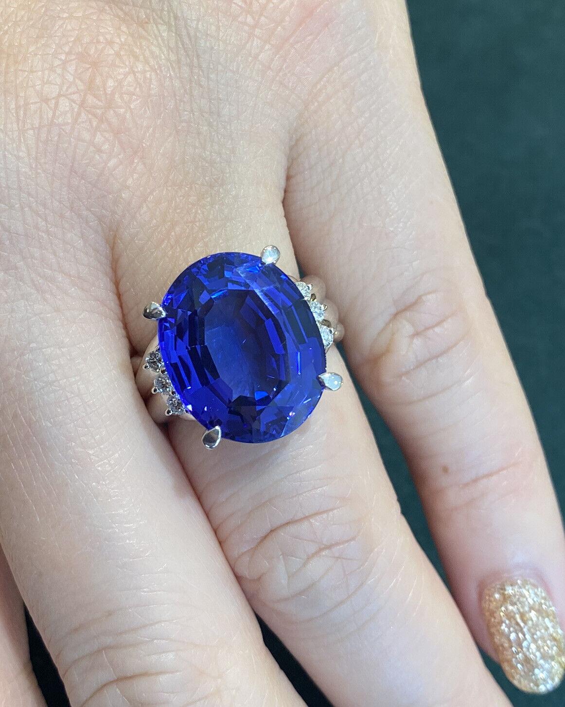 GIA Certified Oval Tanzanite and Diamond Ring in Platinum

Oval Tanzanite & Diamond Ring features an Oval shaped Tanzanite in the center with Six Round Brilliant cut Diamonds on the sides set in Platinum.

Tanzanite weight is 12.80 carats and is GIA