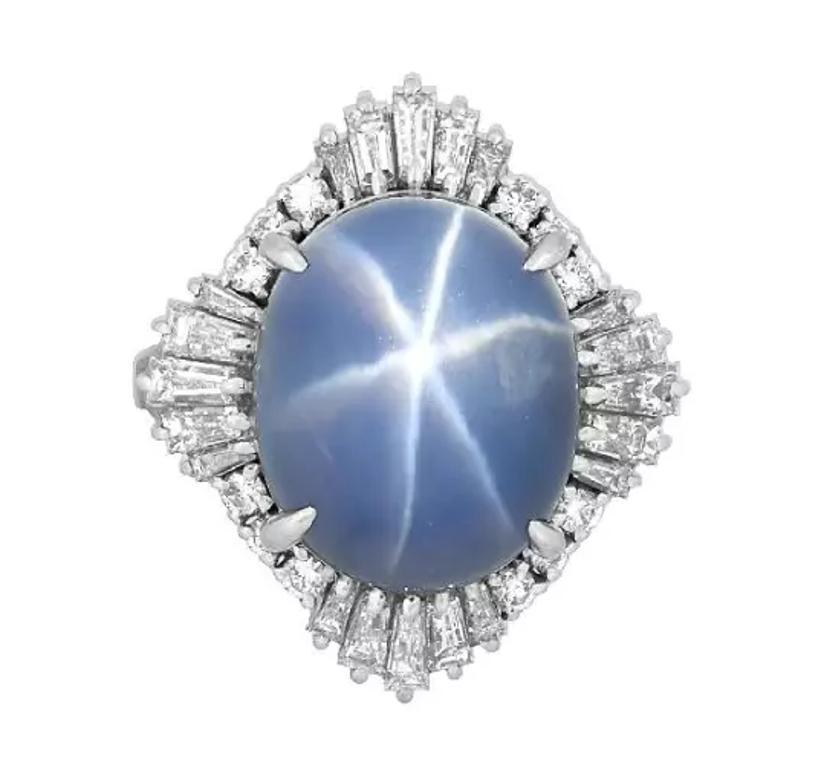 Oval Cut GIA 12.95 carats Unheated Blue Star Sapphire and Diamond Ring in Platinum For Sale